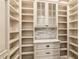 Walk-in pantry with ample shelving and storage space at 8109 Lawnview, Alpharetta, GA 30022