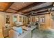 Covered patio with stone flooring and wood paneled ceiling at 8109 Lawnview, Alpharetta, GA 30022