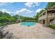 Luxurious backyard pool with comfortable lounge chairs, cabana, and manicured landscaping at 8109 Lawnview, Alpharetta, GA 30022