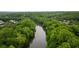 Overhead view of the river surrounded by lush, dense forest at 8109 Lawnview, Alpharetta, GA 30022