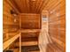 Cozy sauna with wood benches, a stone floor, and ambient lighting for a relaxing and rejuvenating experience at 8109 Lawnview, Alpharetta, GA 30022