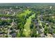 Breathtaking aerial view overlooking the golf course and surrounding neighborhood, a golfer's dream community at 8745 Islesworth Ct, Duluth, GA 30097