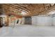 Open basement with concrete walls and ceiling insulation ready to be customized at 8745 Islesworth Ct, Duluth, GA 30097
