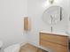 Bathroom with wood vanity and built in storage at 8745 Islesworth Ct, Duluth, GA 30097