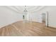 Spacious bedroom featuring hardwood floors, natural light, and high ceilings at 8745 Islesworth Ct, Duluth, GA 30097