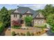 Beautiful brick home with manicured landscaping and a welcoming front entrance at 8745 Islesworth Ct, Duluth, GA 30097