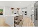 Bright kitchen features a large island, stainless appliances, and modern design at 8745 Islesworth Ct, Duluth, GA 30097