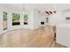 Open floor plan living area with access to outdoor space and fireplace at 8745 Islesworth Ct, Duluth, GA 30097