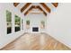 Beautiful living room with high ceilings and modern fireplace at 8745 Islesworth Ct, Duluth, GA 30097