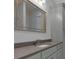 Grey cabinets and a wide countertop highlight a modern bathroom vanity at 12 Cedar Gate Ln, Kingston, GA 30145