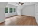 Spacious bedroom features hardwood floors, lots of windows, and a ceiling fan at 12 Cedar Gate Ln, Kingston, GA 30145