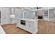 Spacious kitchen featuring a kitchen island and stainless steel appliances at 12 Cedar Gate Ln, Kingston, GA 30145