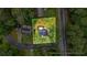 An aerial view of the property, showing landscaping and location at 1355 Tucker Woods Dr, Norcross, GA 30093