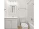 Bright bathroom featuring white fixtures, vanity with storage, toilet, and shower-tub combination at 1355 Tucker Woods Dr, Norcross, GA 30093