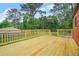 Expansive deck perfect for outdoor entertaining, overlooking the backyard at 1355 Tucker Woods Dr, Norcross, GA 30093