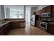 Traditional kitchen with stainless steel appliances, granite countertops, and tile backsplash at 2275 Copper Trail Ln, Buford, GA 30519