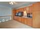 Large bonus room with custom built-ins for storage, media, and display at 3381 Grovewood Ln, Duluth, GA 30096