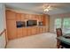 Spacious bonus room featuring abundant storage, built-in cabinets, and natural light at 3381 Grovewood Ln, Duluth, GA 30096
