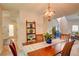 Dining room with view of the staircase and open floor plan at 3381 Grovewood Ln, Duluth, GA 30096
