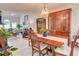Open-concept dining room showcasing table, chairs, and natural light at 3381 Grovewood Ln, Duluth, GA 30096