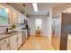 Bright kitchen featuring stainless steel appliances and modern backsplash at 3381 Grovewood Ln, Duluth, GA 30096