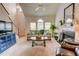 Spacious living room featuring high ceilings, a fireplace, lots of light, and comfortable furniture for relaxation and gatherings at 3381 Grovewood Ln, Duluth, GA 30096
