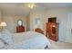 Inviting main bedroom showcases vaulted ceilings, neutral walls, and convenient access to the en-suite bathroom at 3381 Grovewood Ln, Duluth, GA 30096