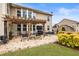 Outdoor patio with a pergola, grill and seating area with a view of the backyard at 4120 Winterberry Rd, Cumming, GA 30040