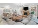 Comfortable living room with a stone fireplace, built-in shelves, and stylish decor at 4120 Winterberry Rd, Cumming, GA 30040
