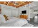 Stylish bedroom with exposed beam ceiling, and neutral color palette at 510 Edgewood Ne Ave # 6, Atlanta, GA 30312