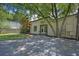 Charming exterior view of home with mature trees and neutral paint at 510 Edgewood Ne Ave # 6, Atlanta, GA 30312