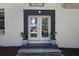 Inviting front entrance with double doors and potted plants at 510 Edgewood Ne Ave # 6, Atlanta, GA 30312