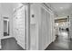 Hallway with ample closet space, a view of the kitchen, and neutral tones creating a clean, modern aesthetic at 510 Edgewood Ne Ave # 6, Atlanta, GA 30312