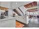 Bright modern kitchen adjacent to an open concept living space with high ceilings and large windows at 510 Edgewood Ne Ave # 6, Atlanta, GA 30312