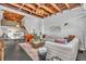 Airy living space with wood beam ceiling, large windows, and modern decor at 510 Edgewood Ne Ave # 6, Atlanta, GA 30312