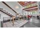 Bright living space featuring high ceilings, large windows, modern staircase, and stylish dining area at 510 Edgewood Ne Ave # 6, Atlanta, GA 30312