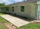 The backyard features a concrete patio perfect for outdoor dining and relaxation at 2251 S Hairston Rd, Decatur, GA 30035