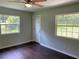 Bedroom featuring hardwood floors and a ceiling fan at 2251 S Hairston Rd, Decatur, GA 30035