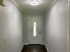 Welcoming entryway featuring a decorative glass front door and dark hardwood flooring at 2251 S Hairston Rd, Decatur, GA 30035