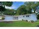 Well-maintained home with a two-car garage, fresh paint, and a neatly manicured lawn at 2251 S Hairston Rd, Decatur, GA 30035