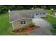Beautiful traditional-style home with stone accents, landscaping, and a long driveway at 2251 S Hairston Rd, Decatur, GA 30035