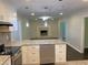 Open kitchen view to living room featuring granite counters and stainless steel dishwasher at 2251 S Hairston Rd, Decatur, GA 30035
