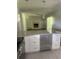 Modern kitchen featuring granite countertops, white cabinets, and stainless steel appliances at 2251 S Hairston Rd, Decatur, GA 30035
