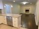 Open concept featuring views from kitchen to living room with cozy fireplace at 2251 S Hairston Rd, Decatur, GA 30035
