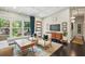 Elegant living space with a large window view, modern decor, and a stylish media center at 3018 Monterey Dr, Decatur, GA 30032