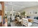 Open-concept living space featuring a modern kitchen, dining area, and sun-filled living room at 3018 Monterey Dr, Decatur, GA 30032
