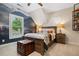 Stylish bedroom featuring a mountain mural, plantation shutters, and wooden accents at 3642 River Club Dr, Cumming, GA 30041