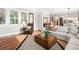 Comfortable living room featuring hardwood floors, neutral colors and modern decor at 3642 River Club Dr, Cumming, GA 30041