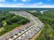 An aerial view of a community bordered by a lake at 207 Hickory Bluffs Pkwy, Canton, GA 30114