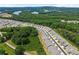 An aerial view of a community by a lake at 207 Hickory Bluffs Pkwy, Canton, GA 30114